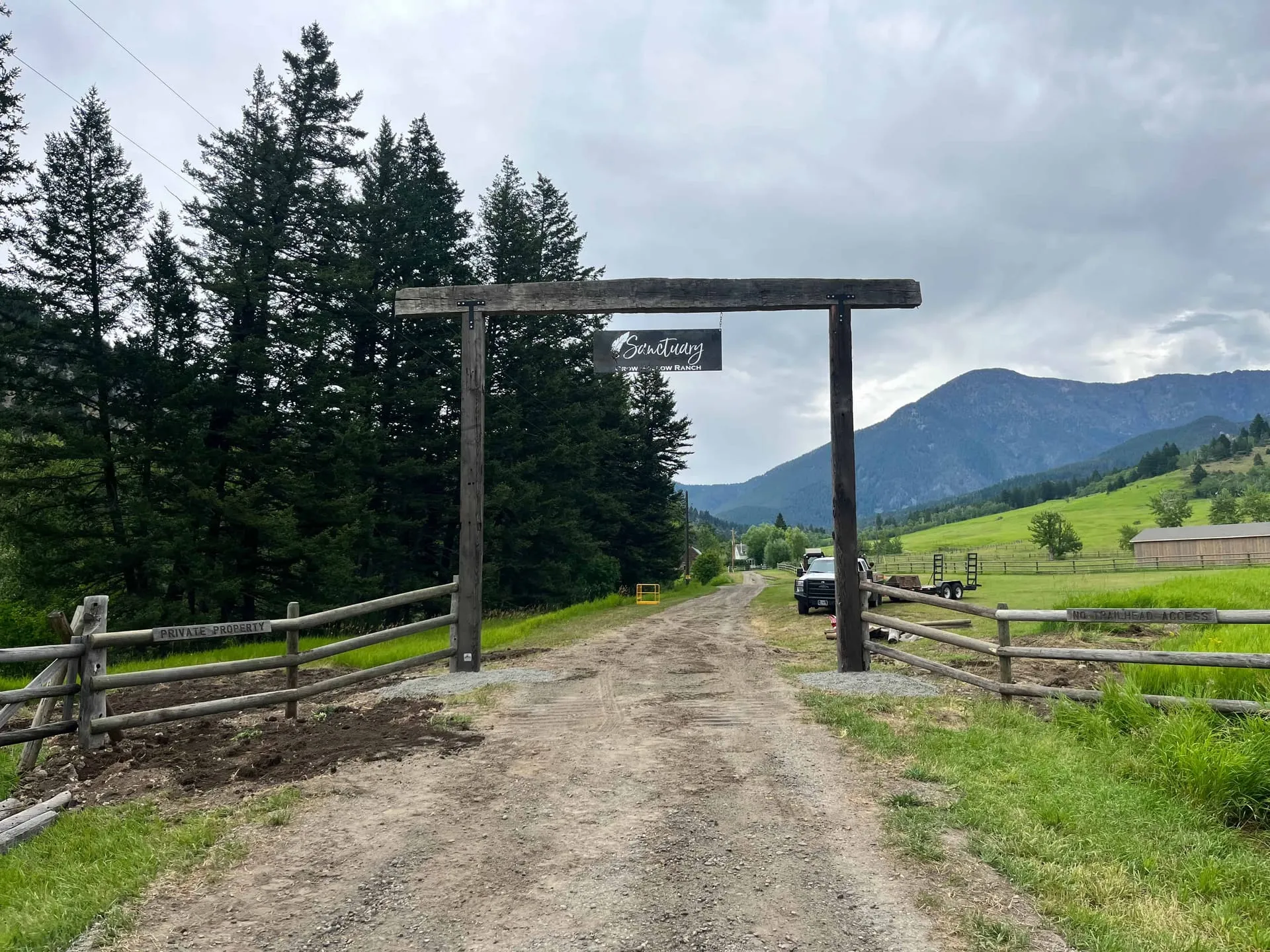 Timber ranch archway over a driveway