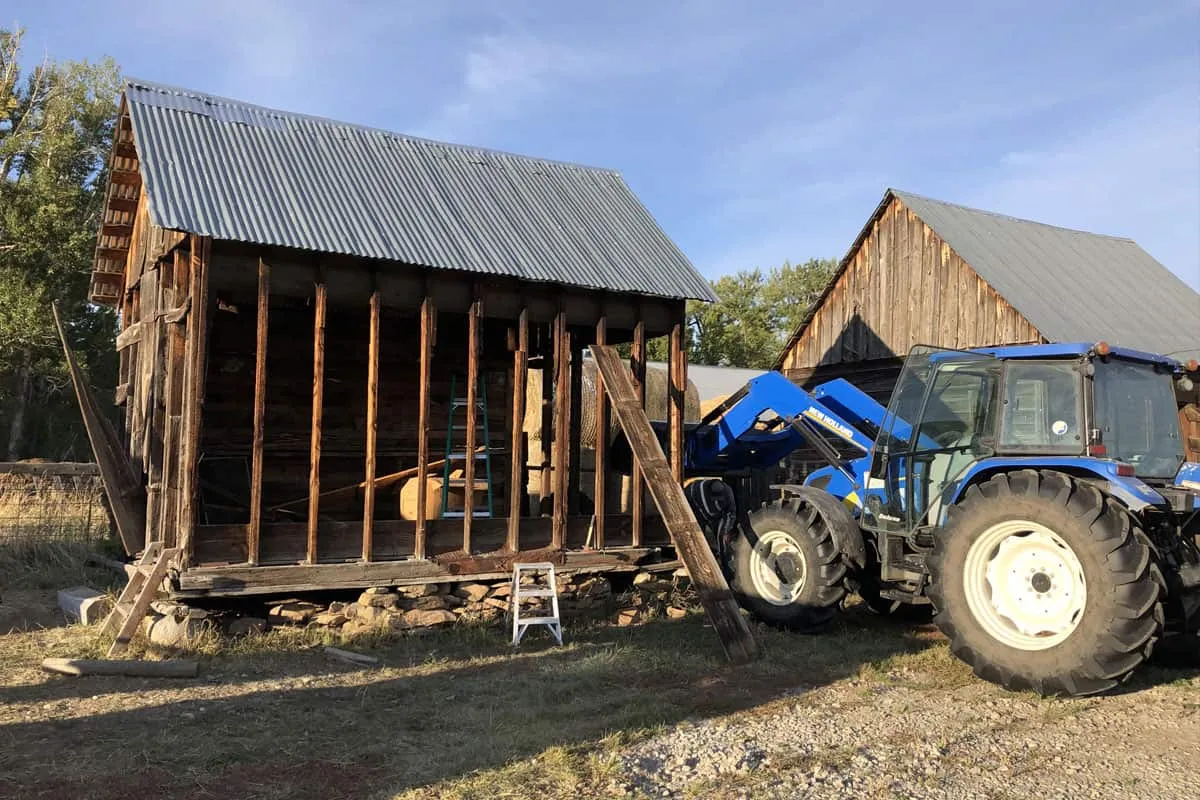 Old barn structure being demolished on a Montana ranch