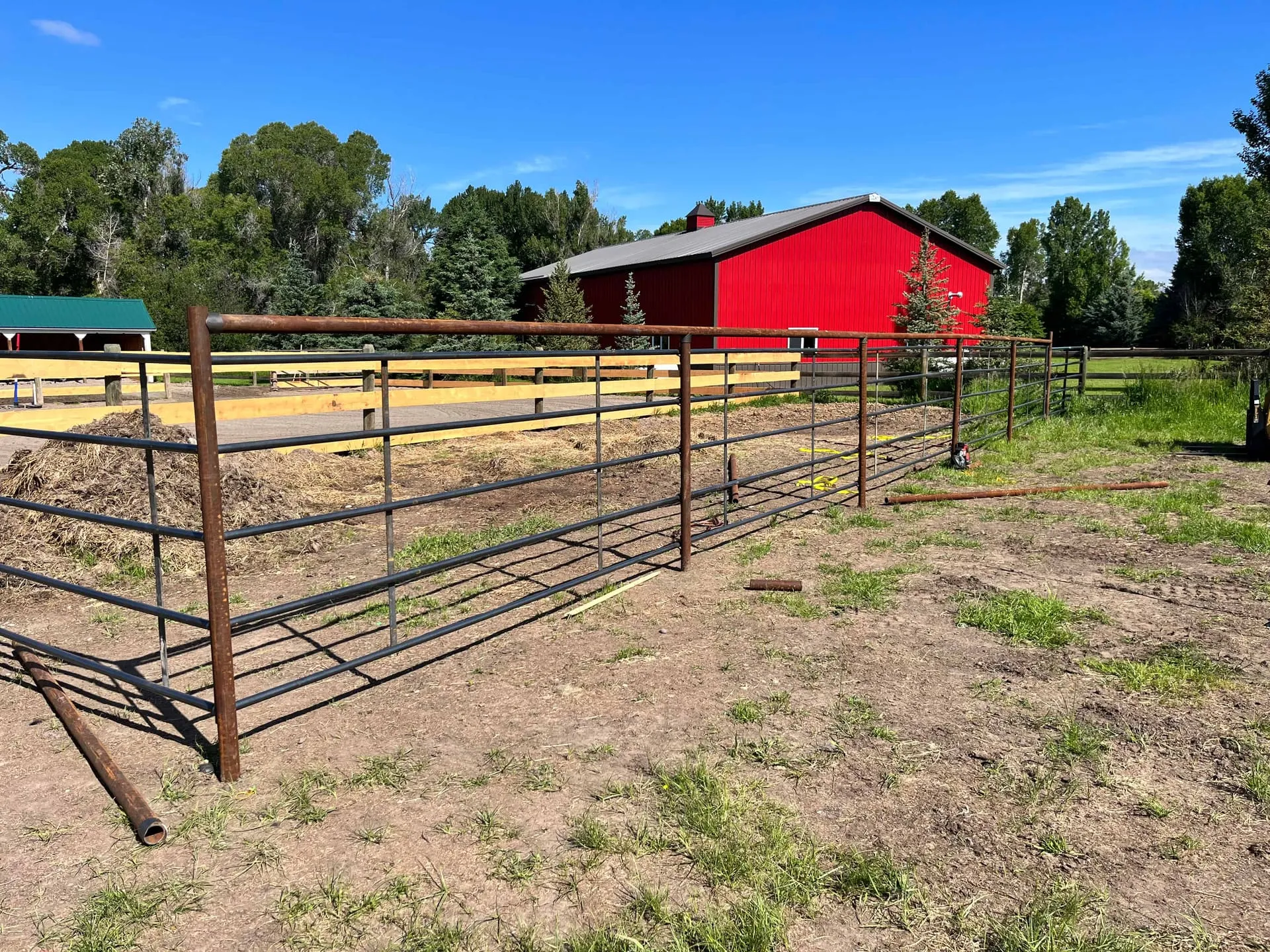 Welded continuous panel fencing for a horse corral