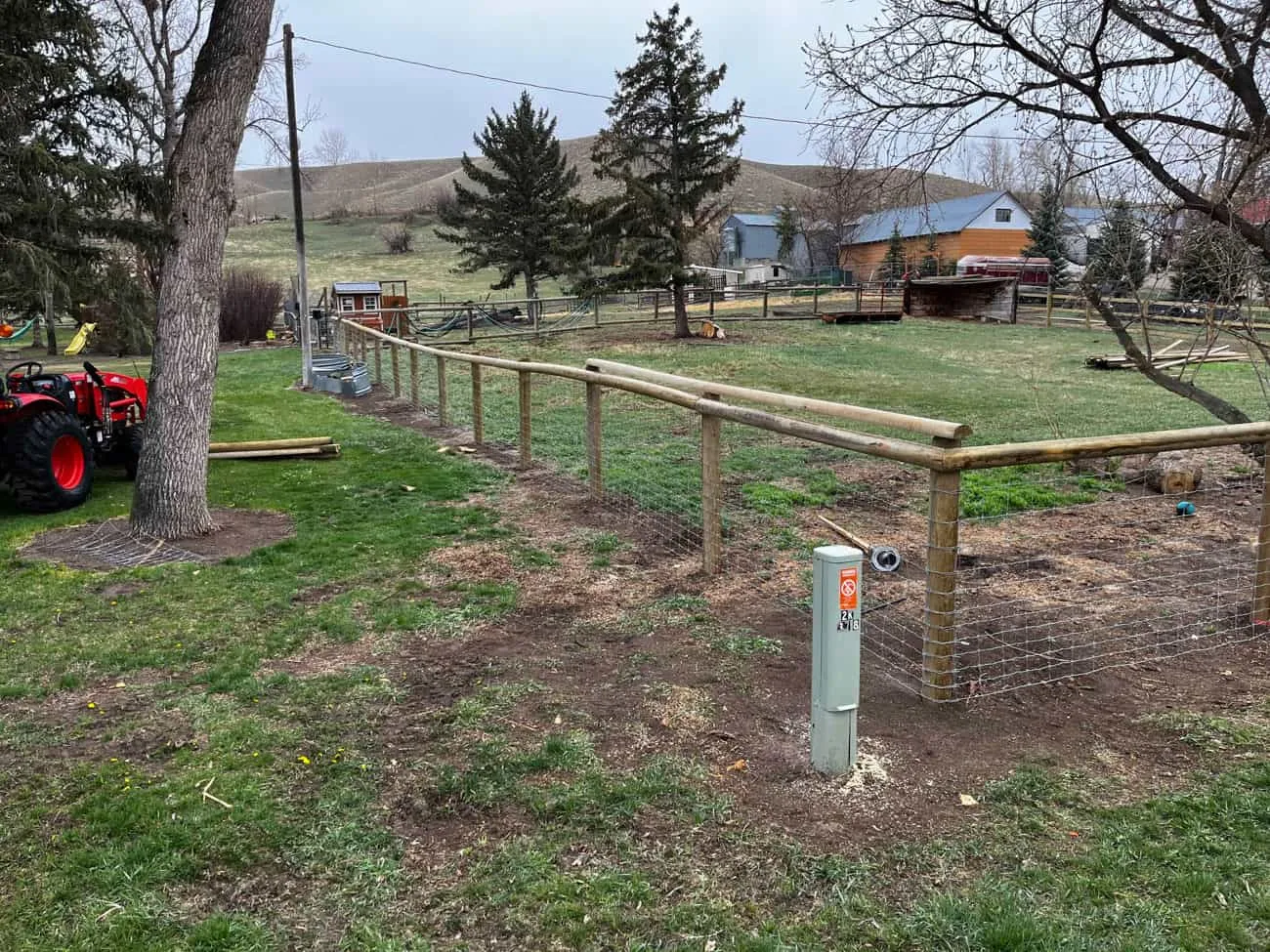 Field fence line securing Montana pasture