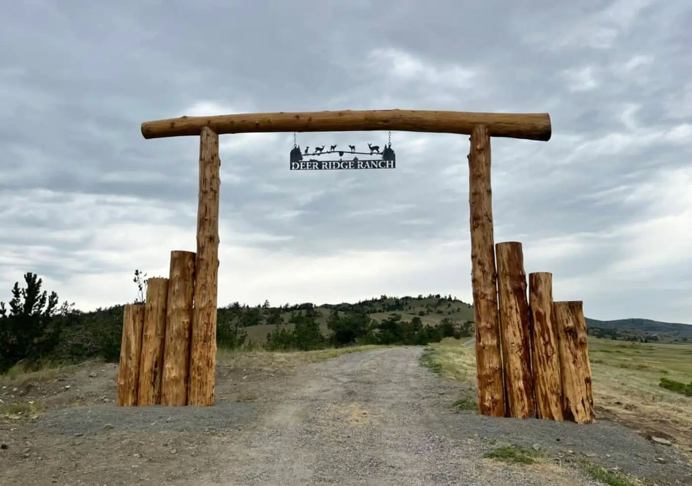 Custom log entryway arch on a Montana ranch